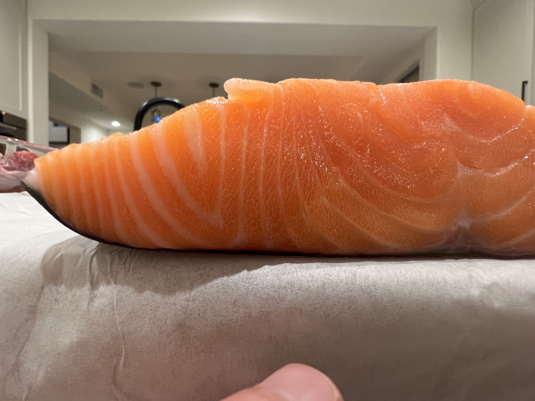 New Zealand King Salmon fillet close-up, warm orange flesh